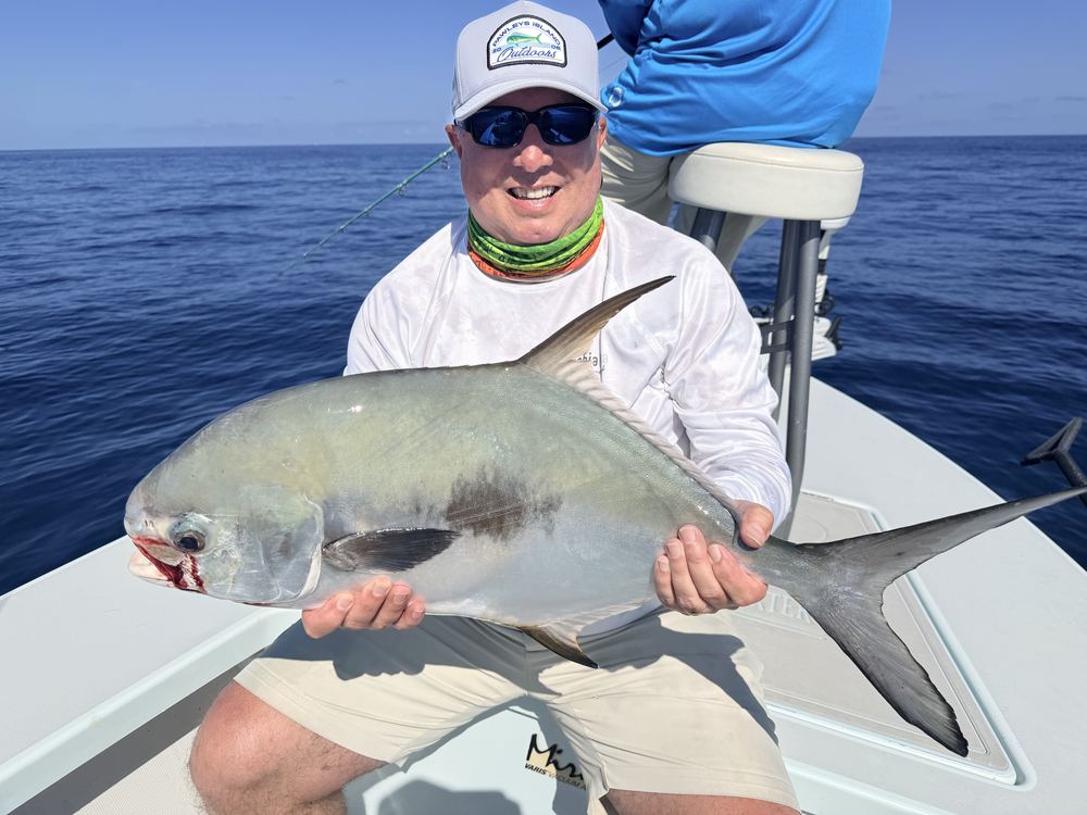 Angler holding a permit on the Lower Keys flats